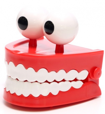 Игрушка заводная пластиковая «Челюсти с глазами»